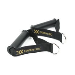 The Exxentric kGrip features black exercise handles with straps and metal rings, branded with Exxentric in yellow text. The handles are displayed parallel to each other against a white background.