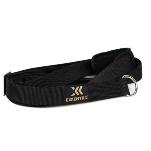 Black Exxentric Rotational Sling exercise belt with a metal ring and Exxentric in gold on the label.