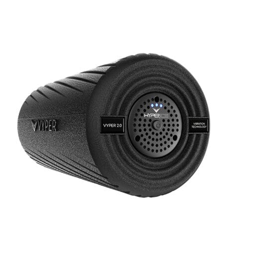 A cylindrical black Hyperice Vyper 2.0 foam roller features a ribbed texture and Vibration Technology on its sides, with a circular, speaker-like component at the end.