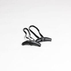 A pair of black, compact folding scissors with a sleek design against a plain white background.