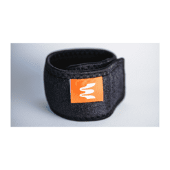 An Enode Extended Strap, a black wrist support wrap, features an orange label with a white wavy line logo against a light gray background.