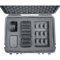 The Enode Pro – Charging Case is shown in black and white, featuring organized electronic accessories. The case neatly arranges cable bundles, rectangular components, and small identical pieces in separate foam compartments.