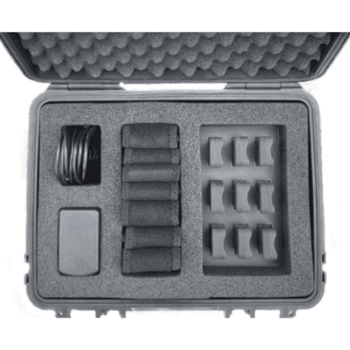 The Enode Pro – Charging Case is shown in black and white, featuring organized electronic accessories. The case neatly arranges cable bundles, rectangular components, and small identical pieces in separate foam compartments.